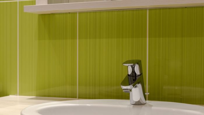 Bathroom vanity of bedrooms at Hotel des Lys