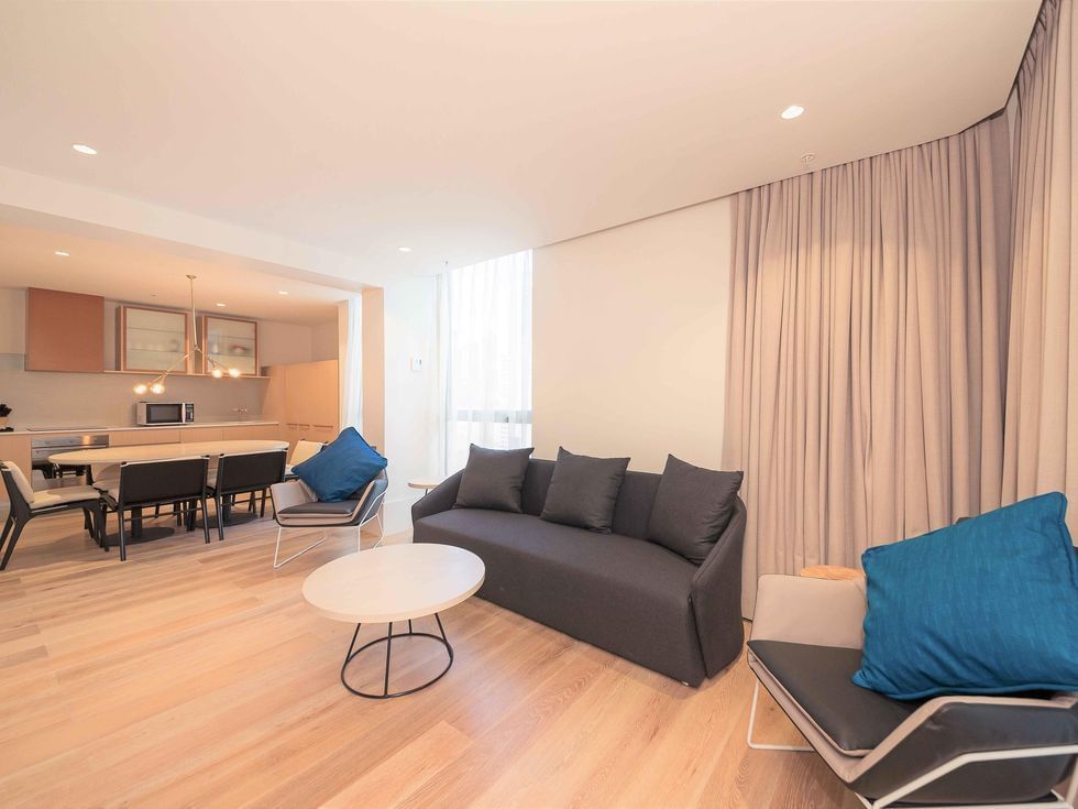 Living area in Two Bedroom Executive Apartment at Brady Hotels Central Melbourne