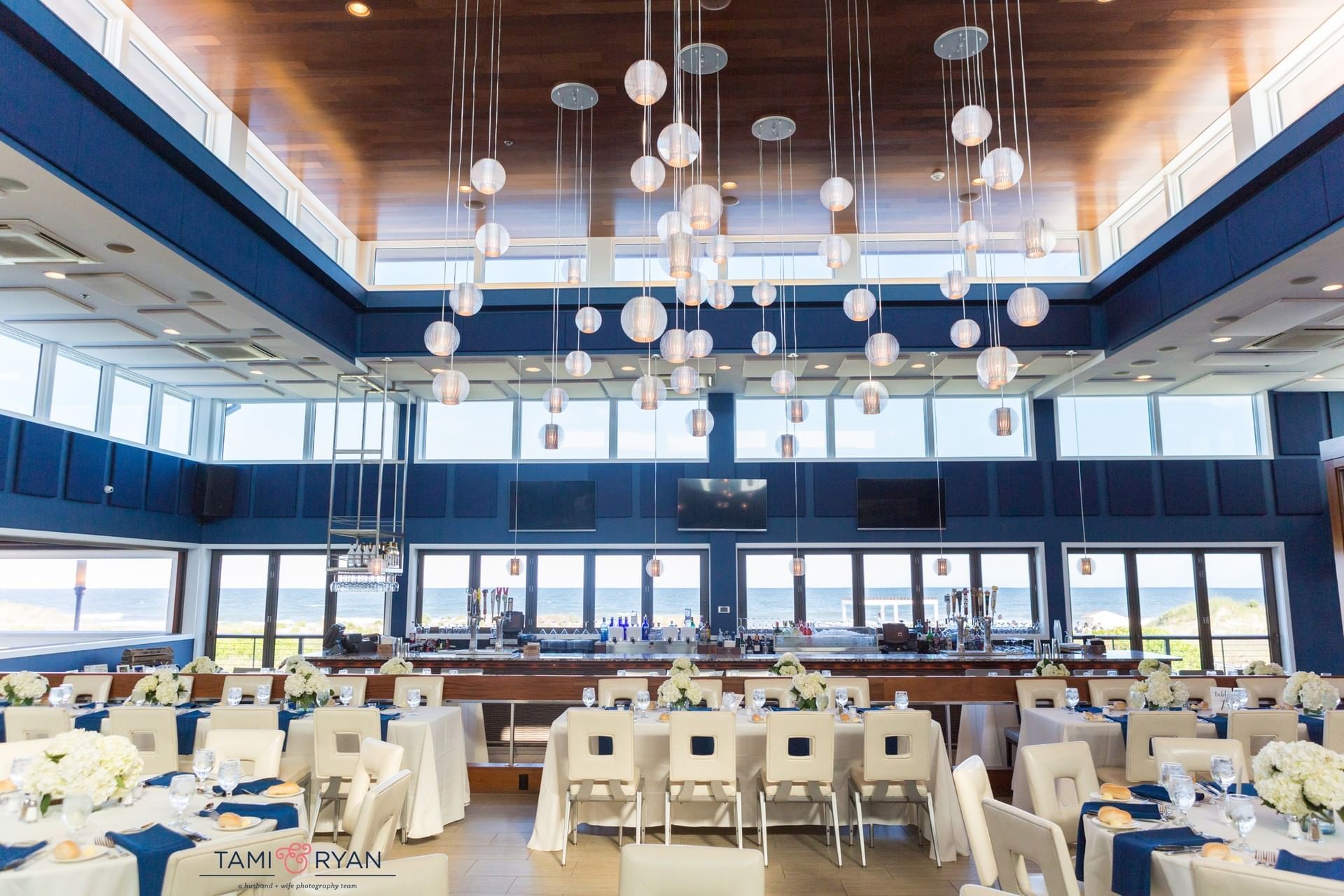 Wide view of a wedding event hall at ICONA Windrift