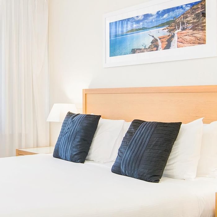 Art hung by the king bed in Executive King Room at Mercure Charlestown