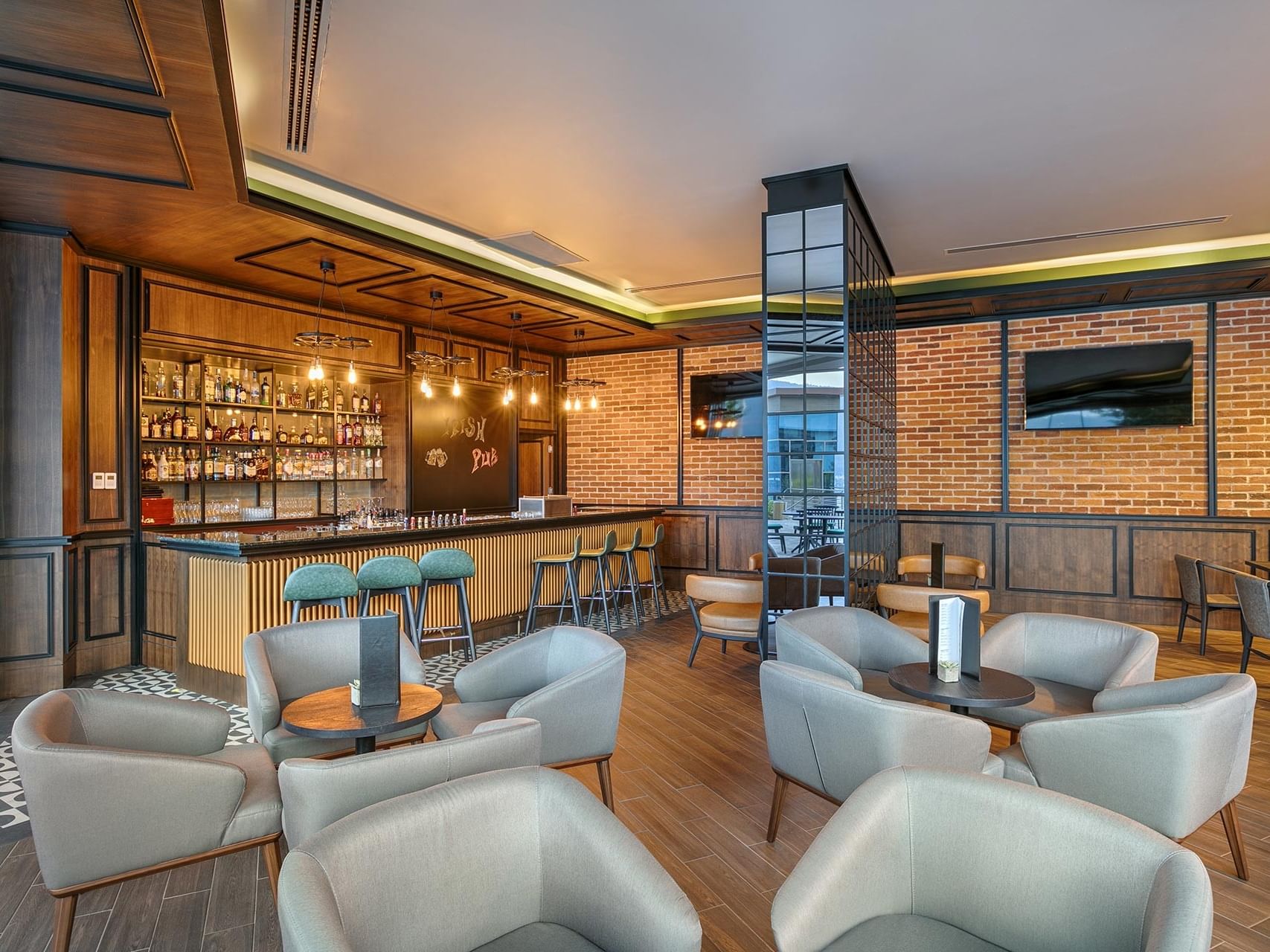 At Titanic Luxury Collection Bodrum, the wooden-floored restaurant offers a sophisticated ambiance with elegant details.