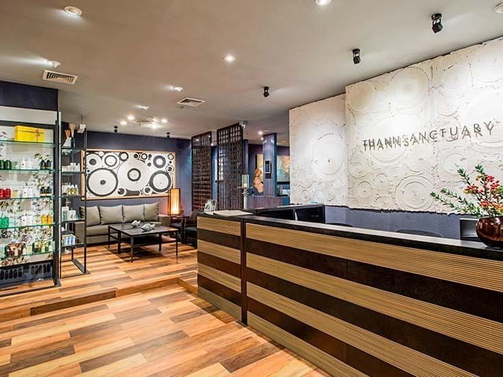 Thann Sanctuary reception at Chatrium Hotels & Residences