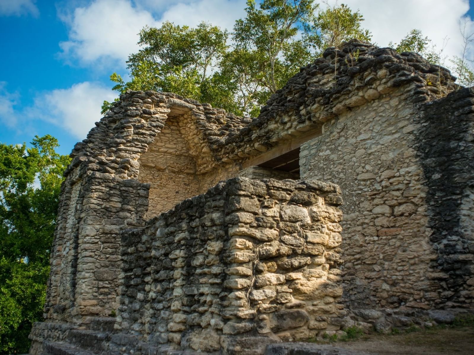 Exterior view of an antient ruin near La Colección Resorts