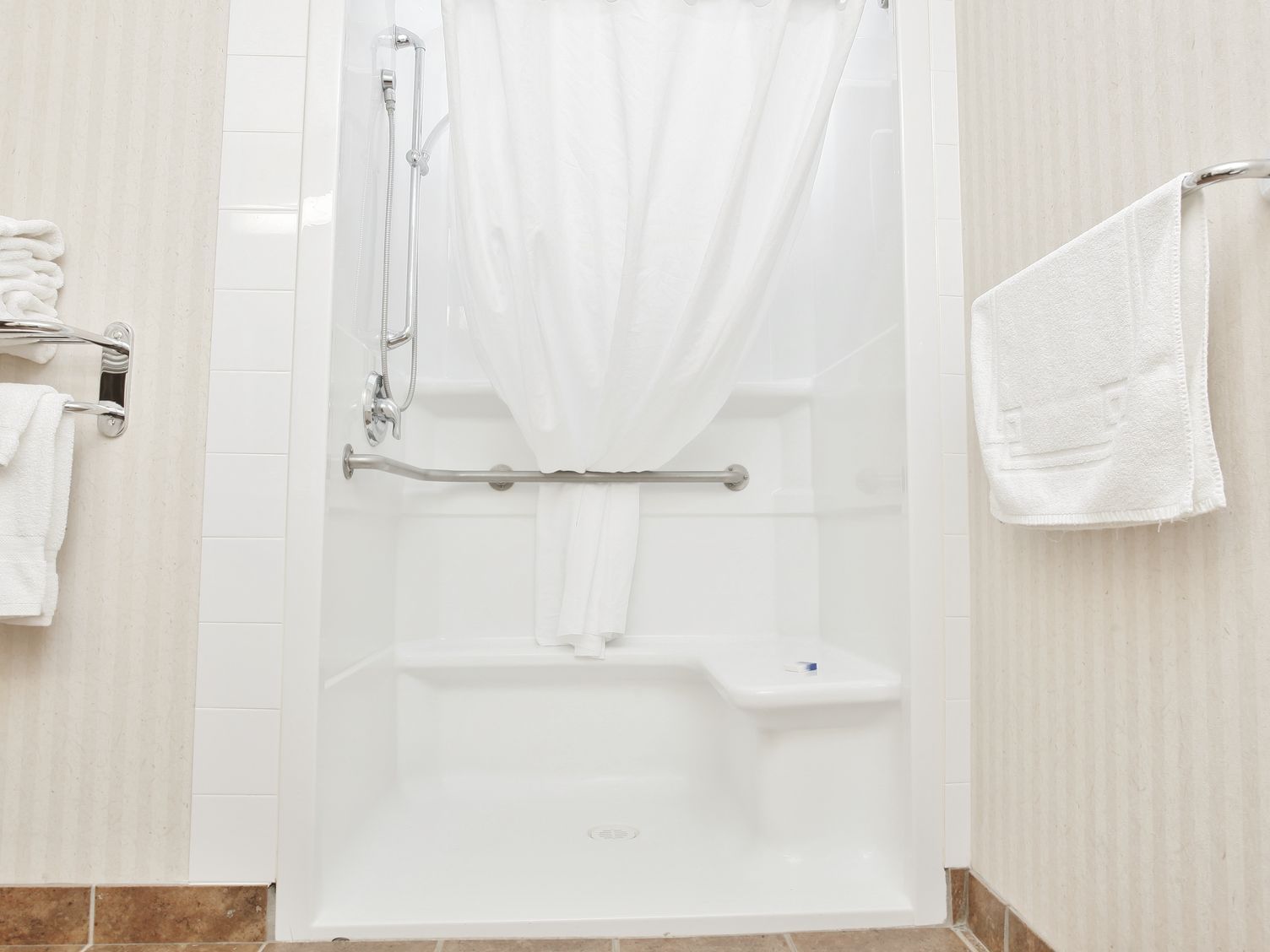 an accessible shower in a bathroom