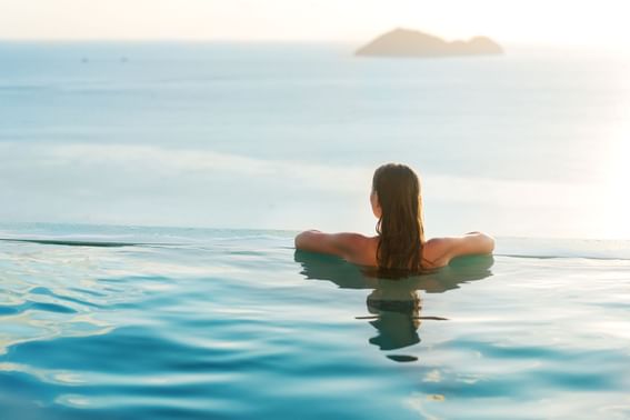 A lady relaxing in the pool at Sunseeker Resort