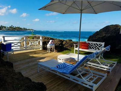 Resting area with Two sun loungers at Condado Plaza Hilton