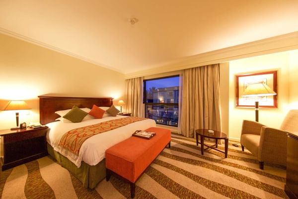 Interior Deluxe Room with king bed at Kigali Serena Hotel
