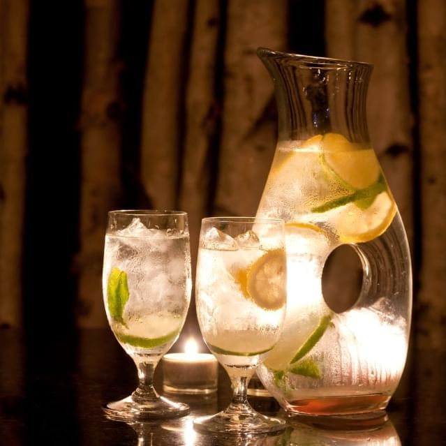 Closeup of ice water& lemons in spa room at Chase on The Lake