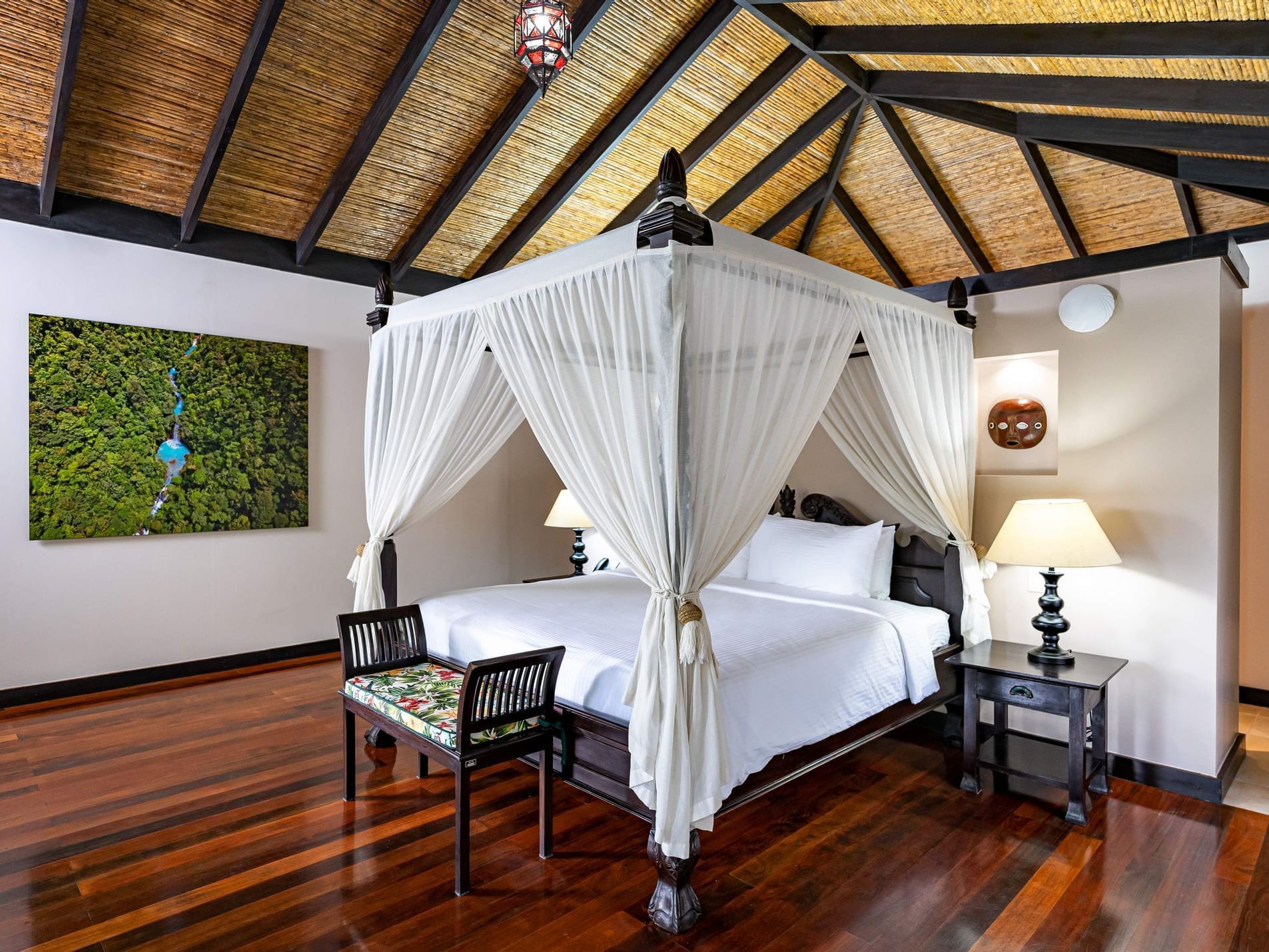 Bed in Casita Deluxe Garden view room at Rio Celeste