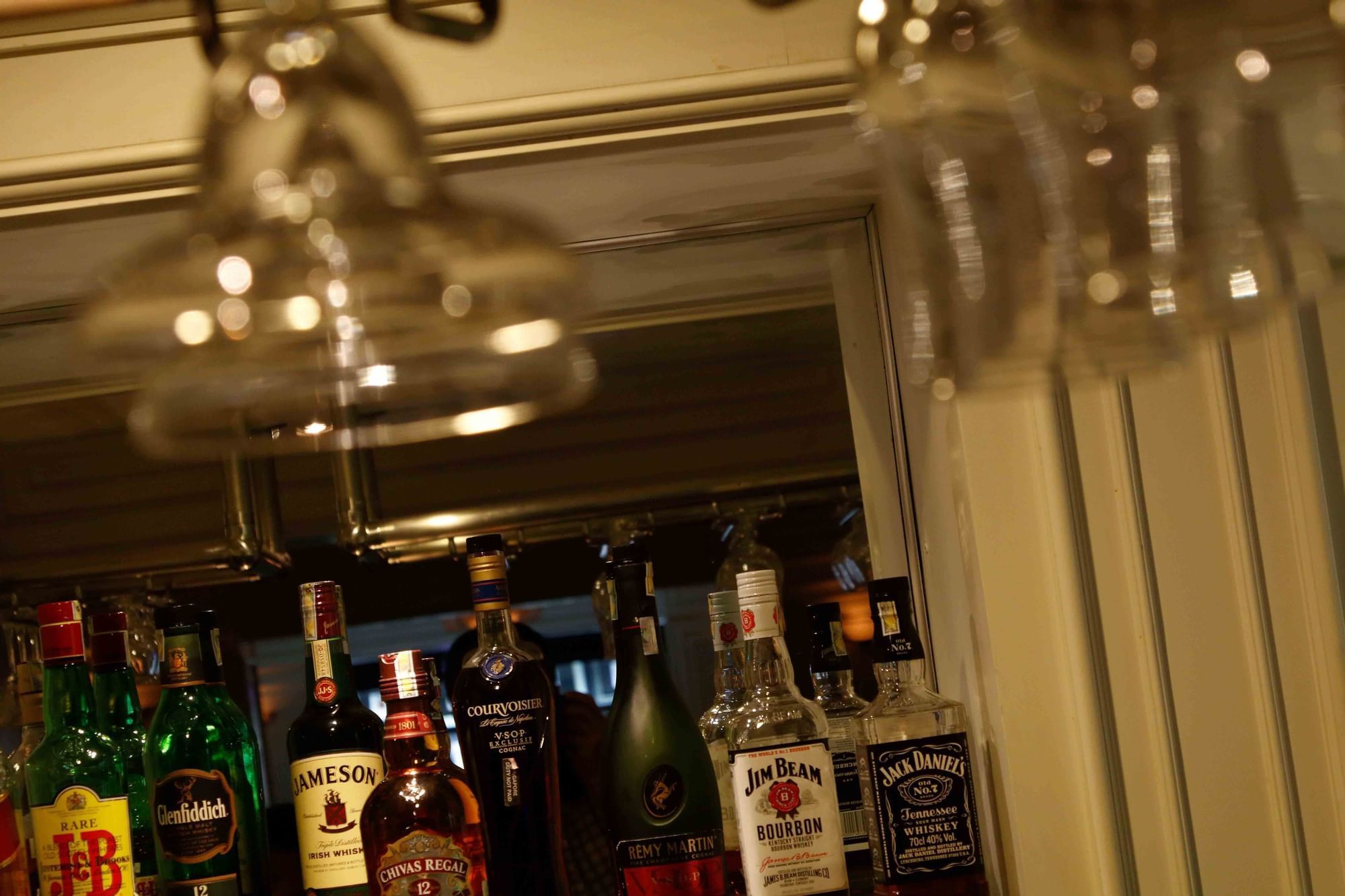 Liquor bottles arranged by The Bar at Sunway Hotel Hanoi