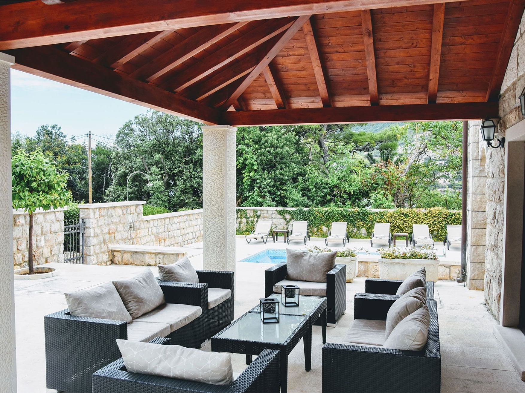 An Outdoor seating area by the pool at Villa Franica