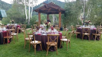 Banquet table setup in the lawn for an event at Stein Lodge