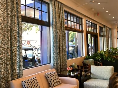 Cozy sofa's arranged by the window in the hotel lobby at Hotel Atwater