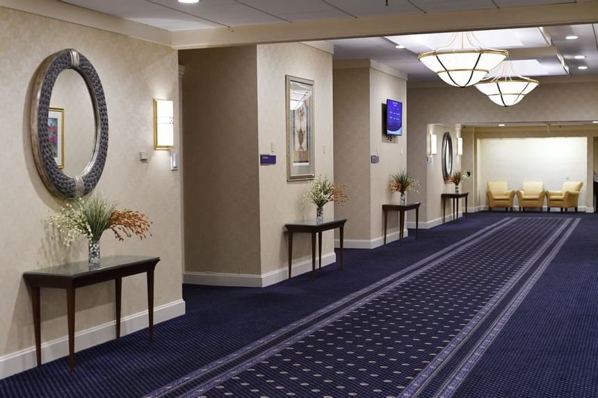 Interior of the hallway with mirror at UMass Lowell Inn