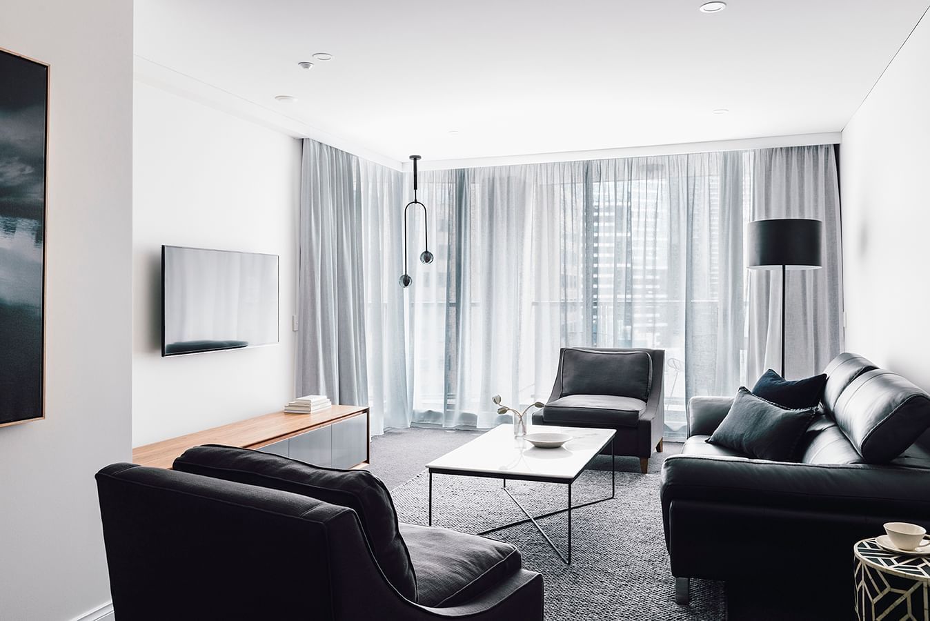 Livingroom area in 2 Bedroom 2 Bathroom Premium Apartment at Quay West Suites Melbourne