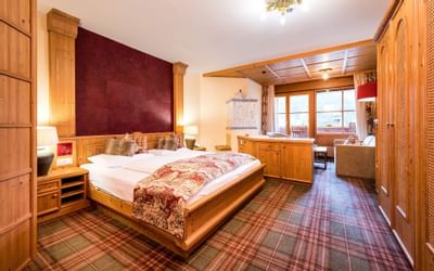 King bed in Premium Double Room at Hotel Liebes Rot Flueh
