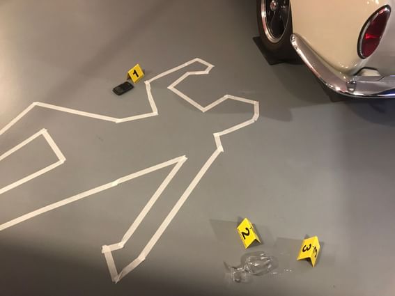 Outline of a car and evidence markers at Starling Hotels in Lausanne Switzerland