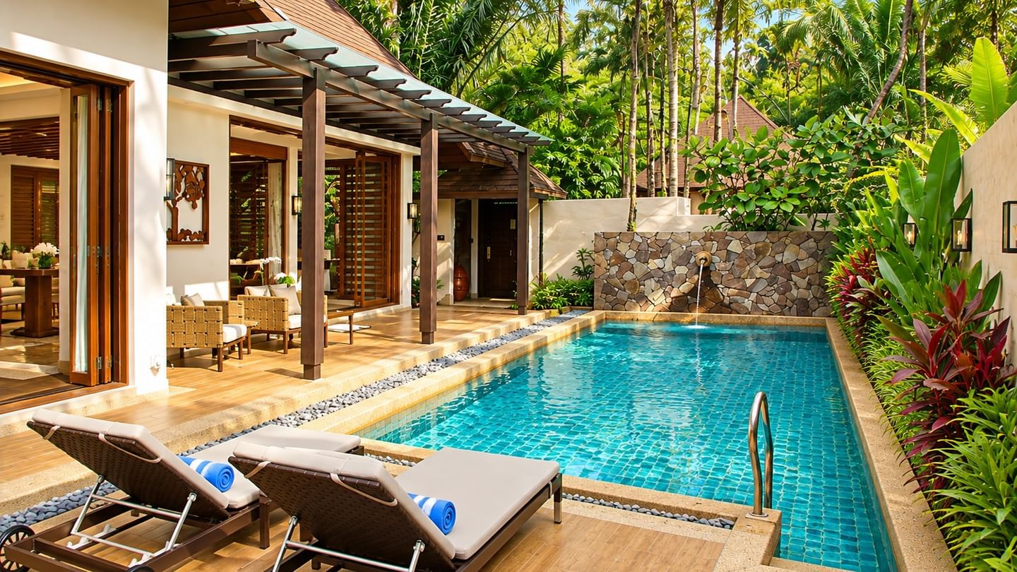 Grand Garden pool villa with sun loungers, covered terrace, and lush tropical garden for Malaysian Residents' Wellness Escape
