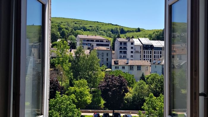 A balcony with city view at Grand Hotel Saint-Pierre