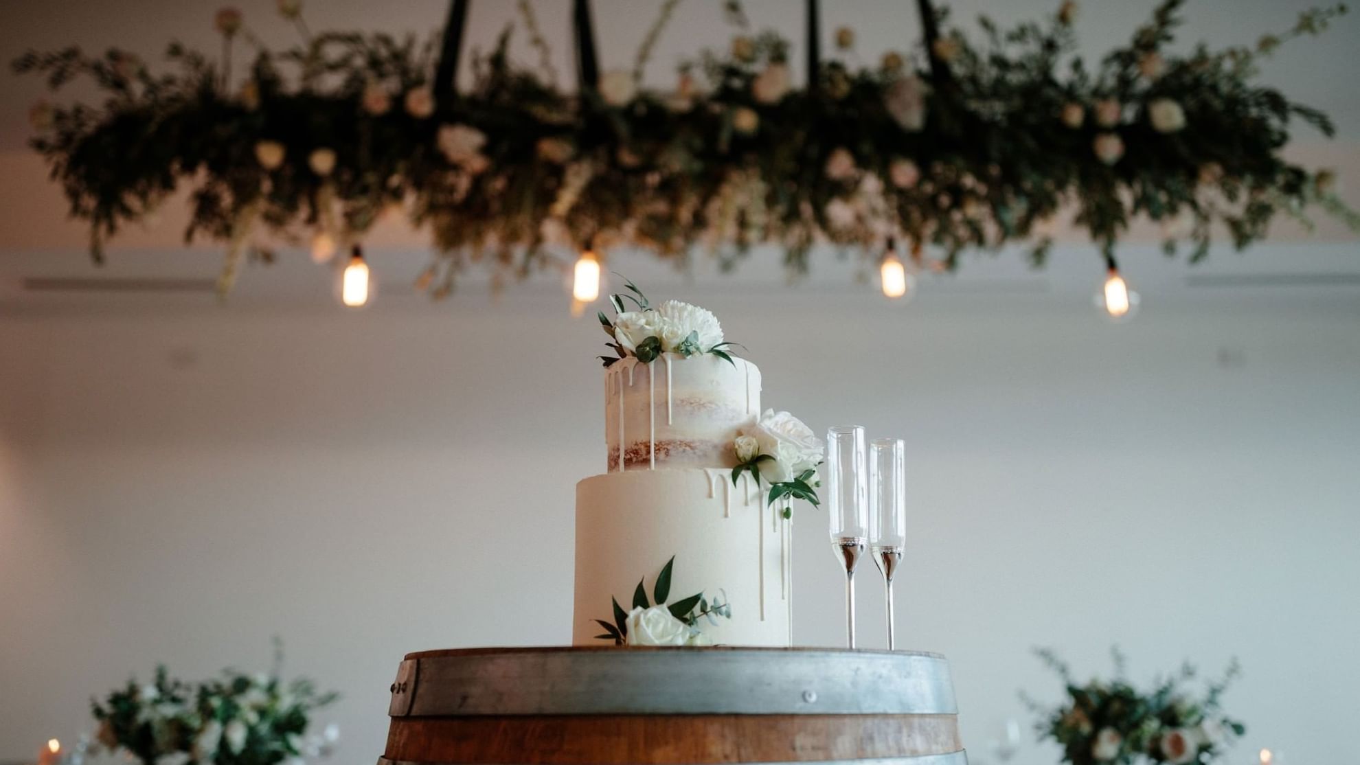 Closeup of wedding cake on a barrel at Novotel Barossa Valley