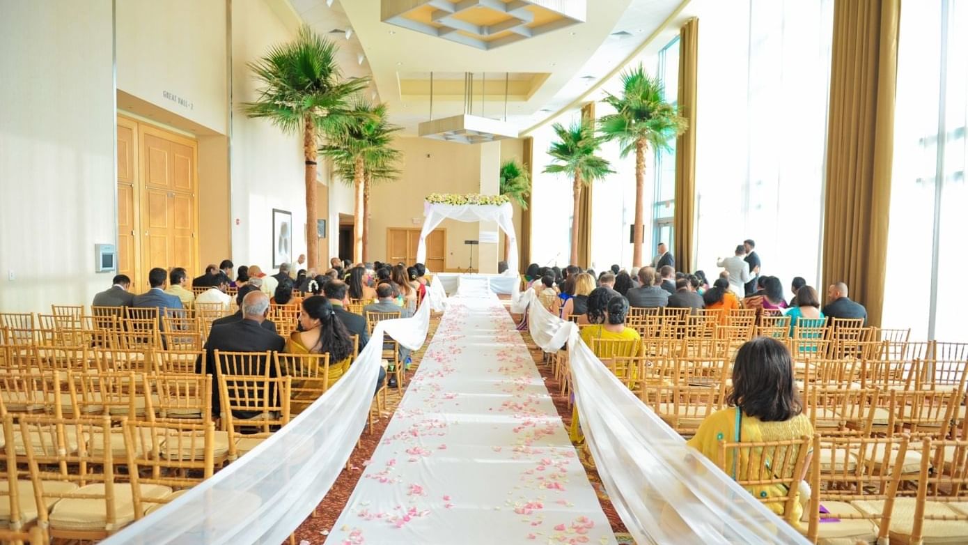 Wedding ceremony in indoor wedding area at The Diplomat Resort