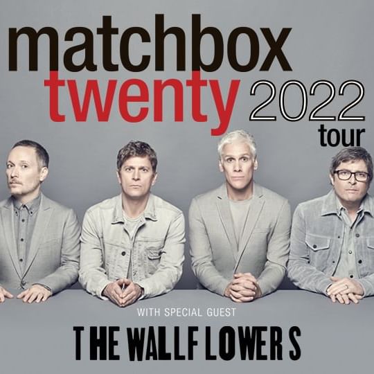 Four members of Matchbox Twenty wearing gray clothes against a gray background