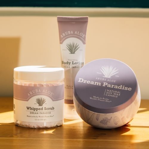 Aruba Aloe wax candle, body lotion, and whipped scrub