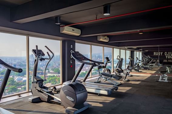 Fitness equipment in the fitness center at LK Hotel Simpang Lima