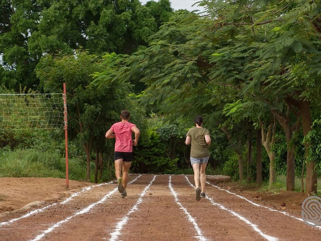 A Couple jogging on a track near Lake Manyara Serena Lodge