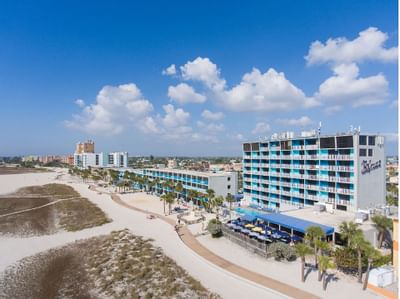aerial view of a hotel on a beach