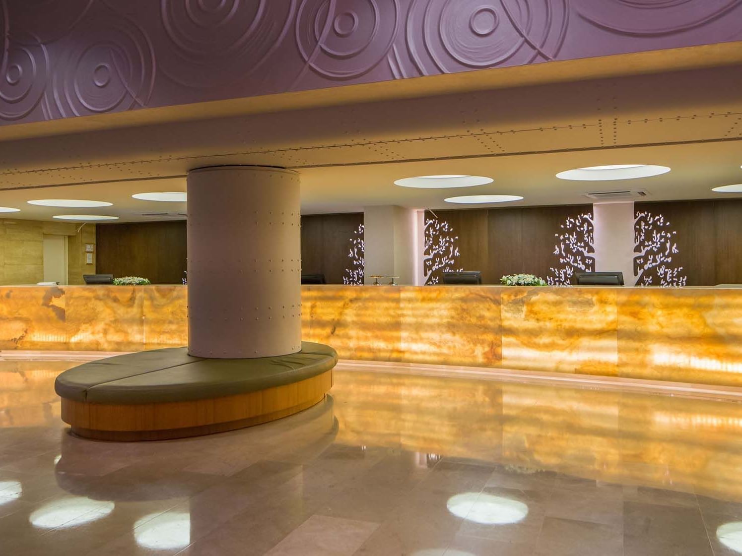 An elegant reception counter area in the hotel lobby at Titanic Deluxe Lara