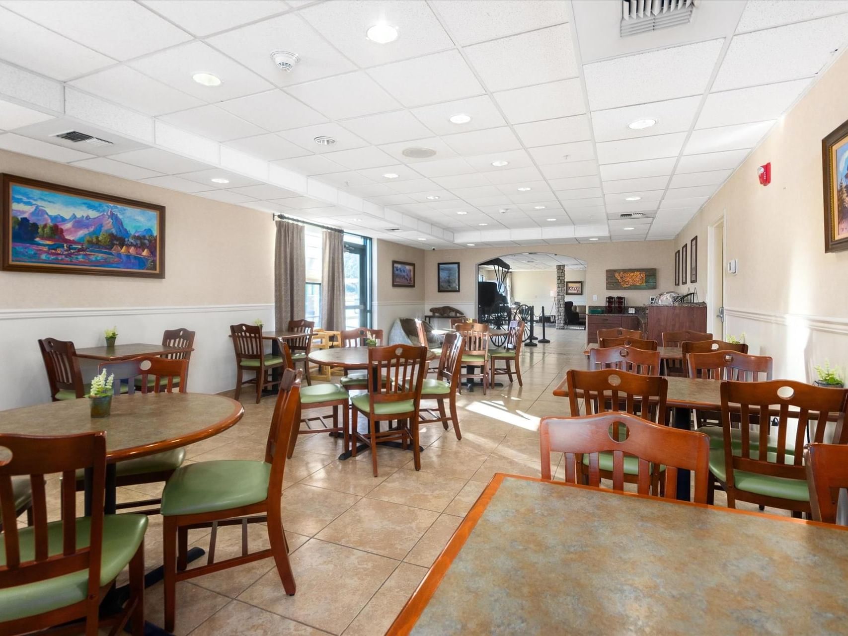Dining area of Complimentary Hot Breakfast Buffet at Boothill Inn & Suites