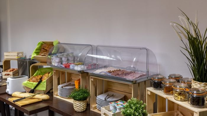 Breakfast station in Kosy Appart Hotels at The Originals Hotels