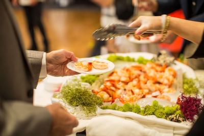 Close-up of served shrimp plate on a table at Honor’s Haven Retreat
