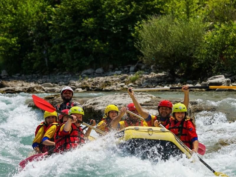 A group rafting on the Gail river near Falkensteiner Hotels