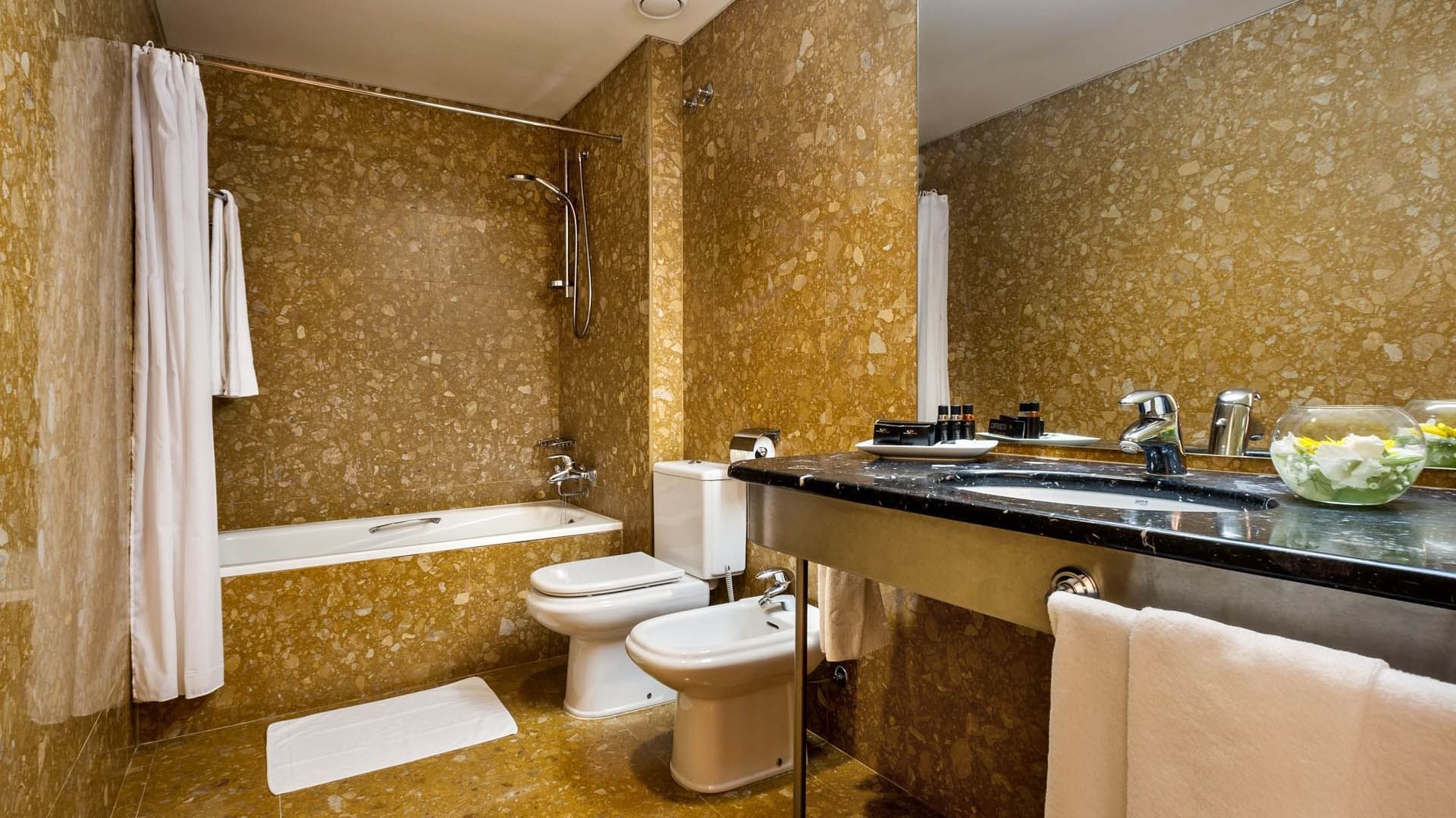 Bathroom of standard plus room at Bensaude Hotels Collection