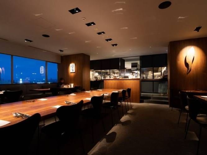 Dining table set-up in Kitchen Restaurant at Chatrium Hotels