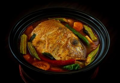 Fish head curry served in White Rose Café at York Hotel Singapore