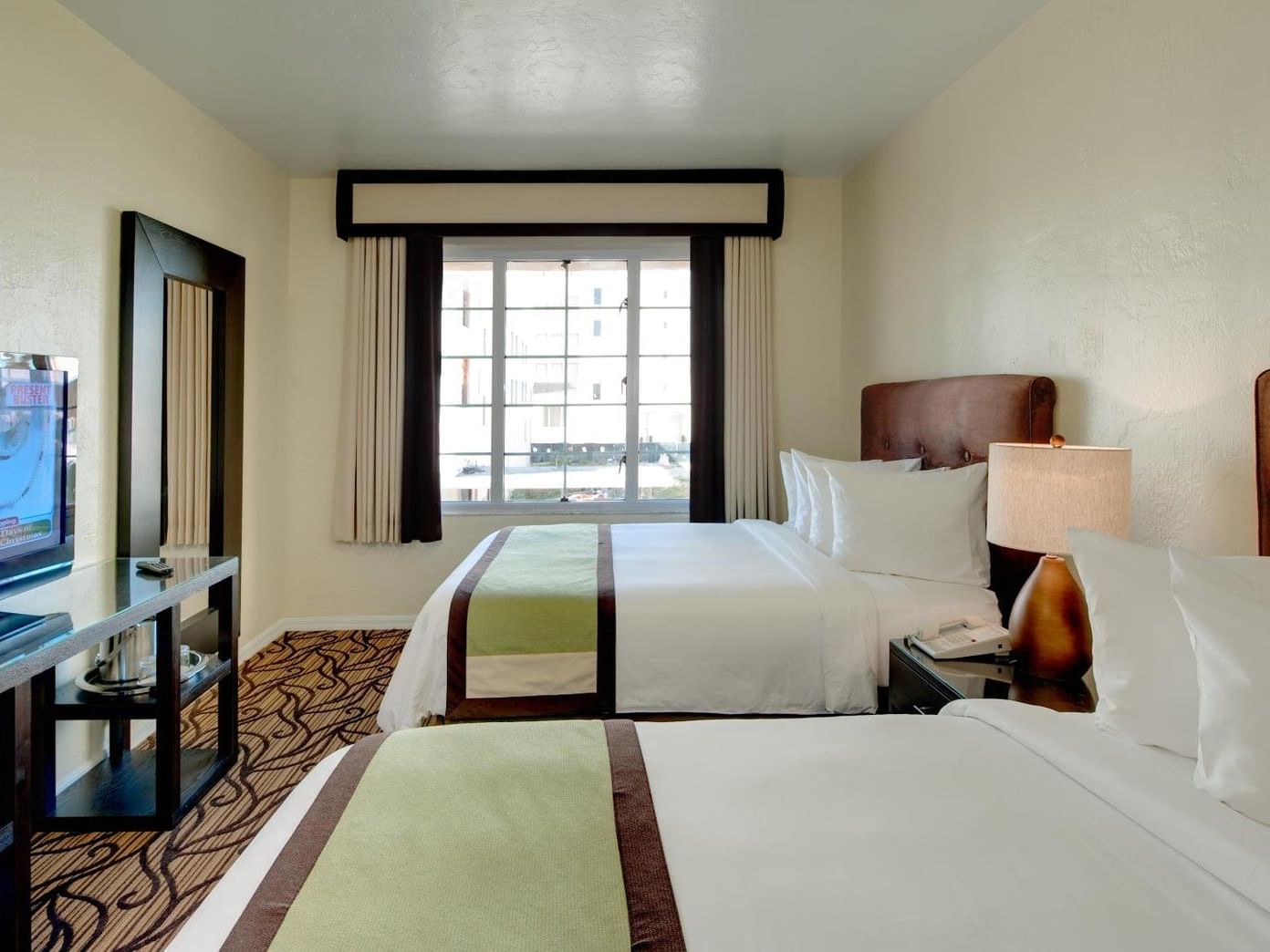 A view of Deluxe Double room with two double beds at Essex House by Clevelander
