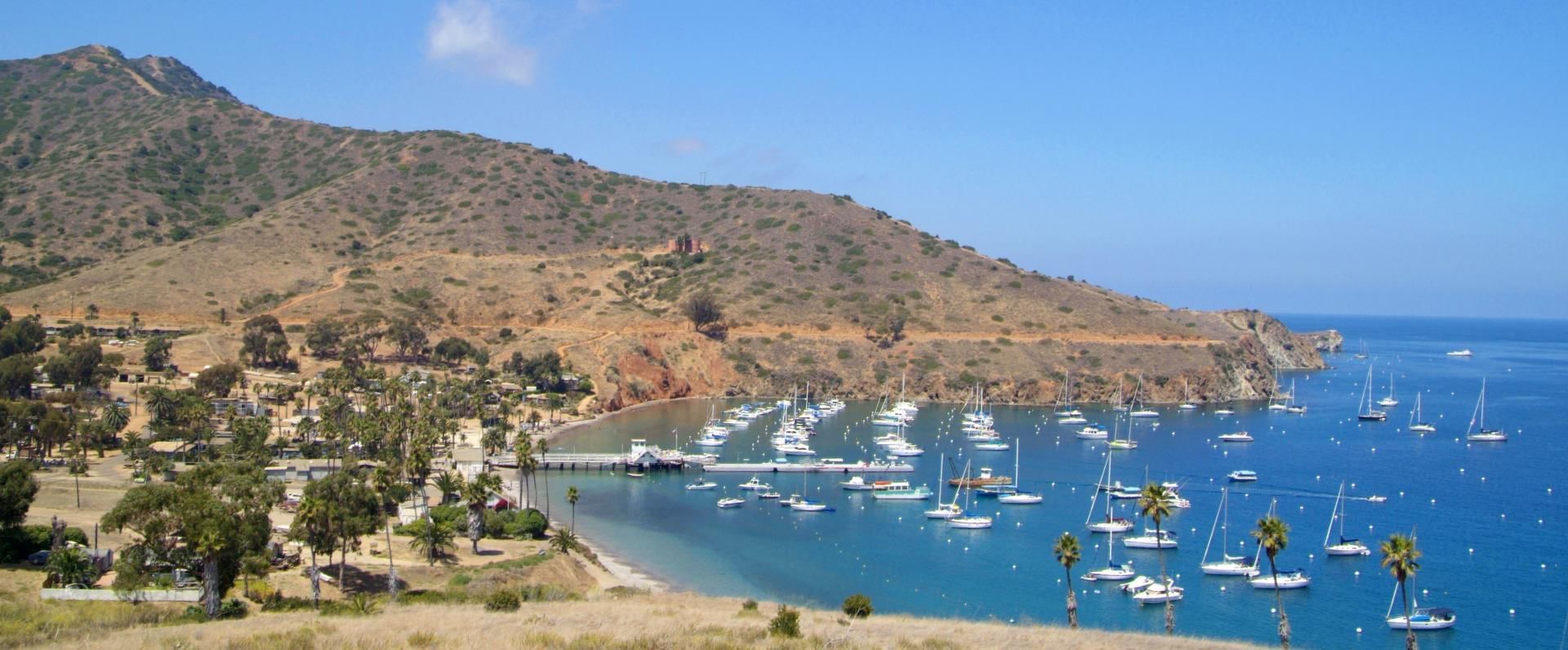 Aerial view the mountain ranges & docked boats near Catalina Island Company