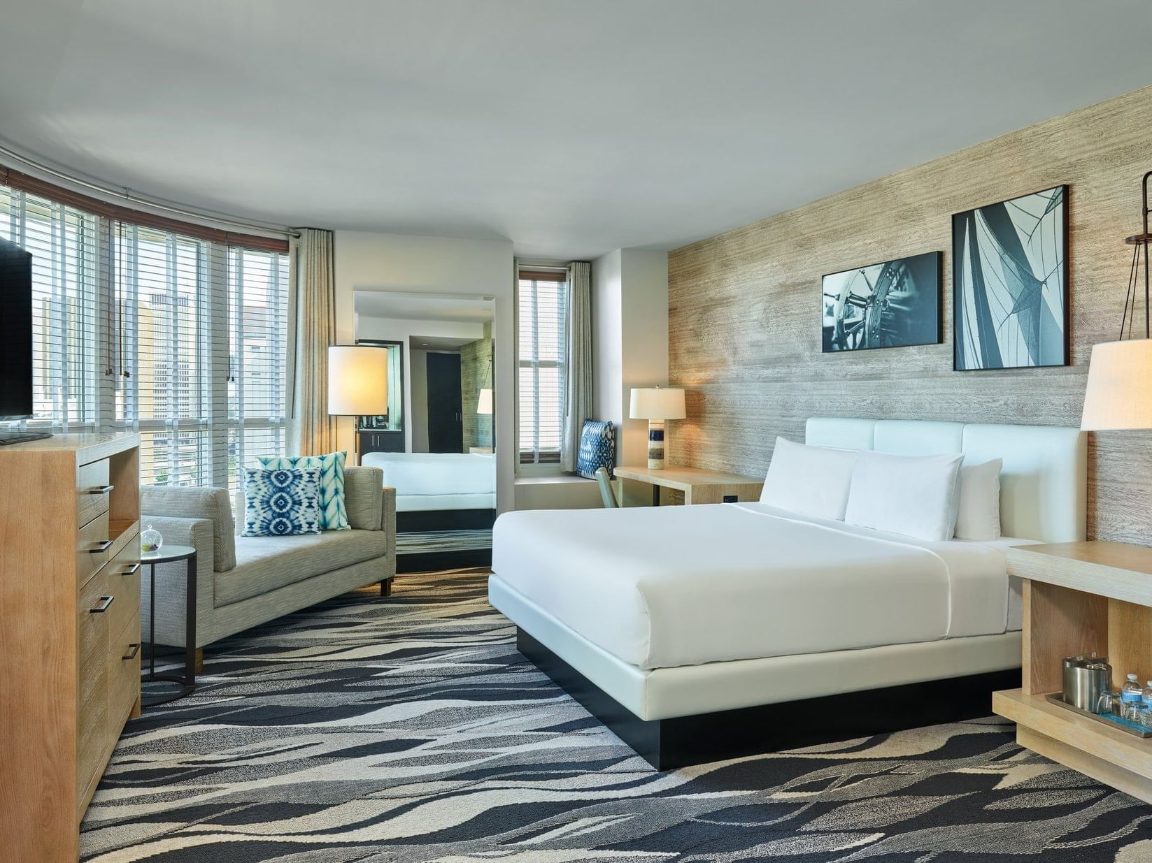 Interior of Prestige Corner Executive Suite with carpeted floors at Hotel Republic San Diego