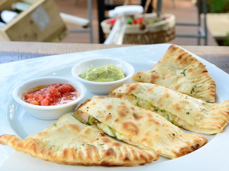 Close-up of Calzone served at Live Aqua Resorts and Residence Club