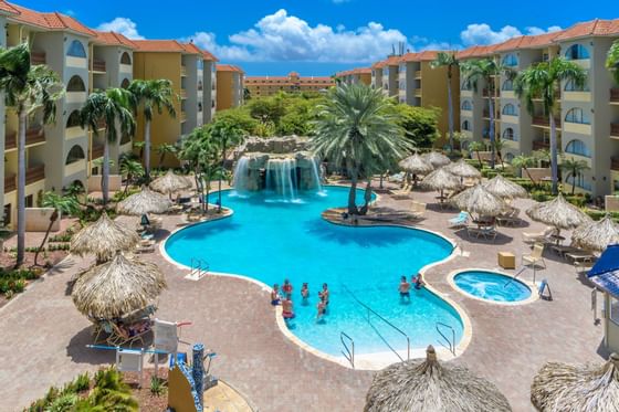 Aerial view of people enjoying in the pool at Eagle Aruba
