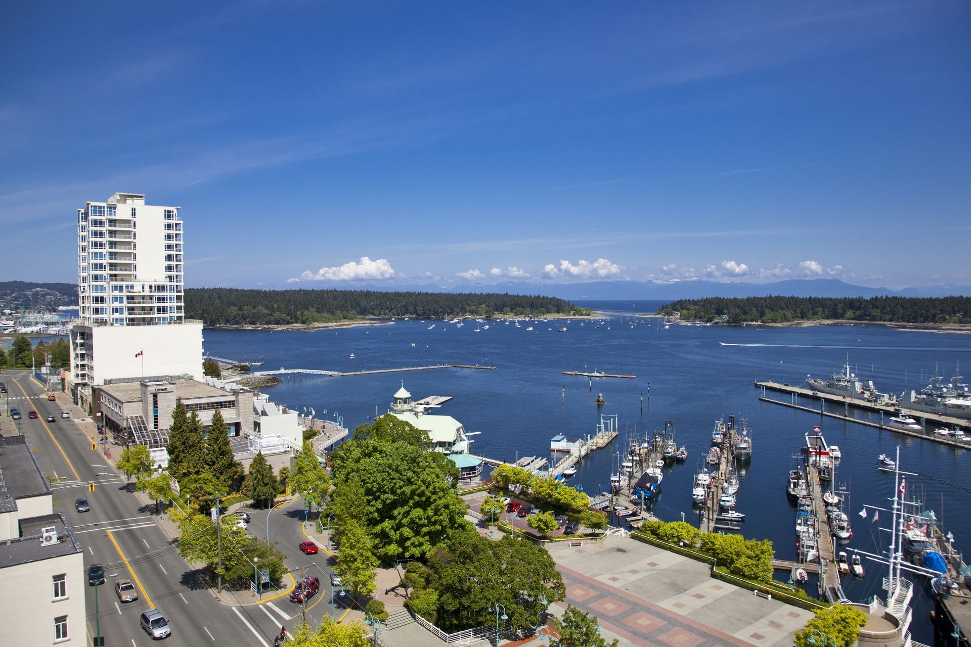 view of ocean, docks and buildings