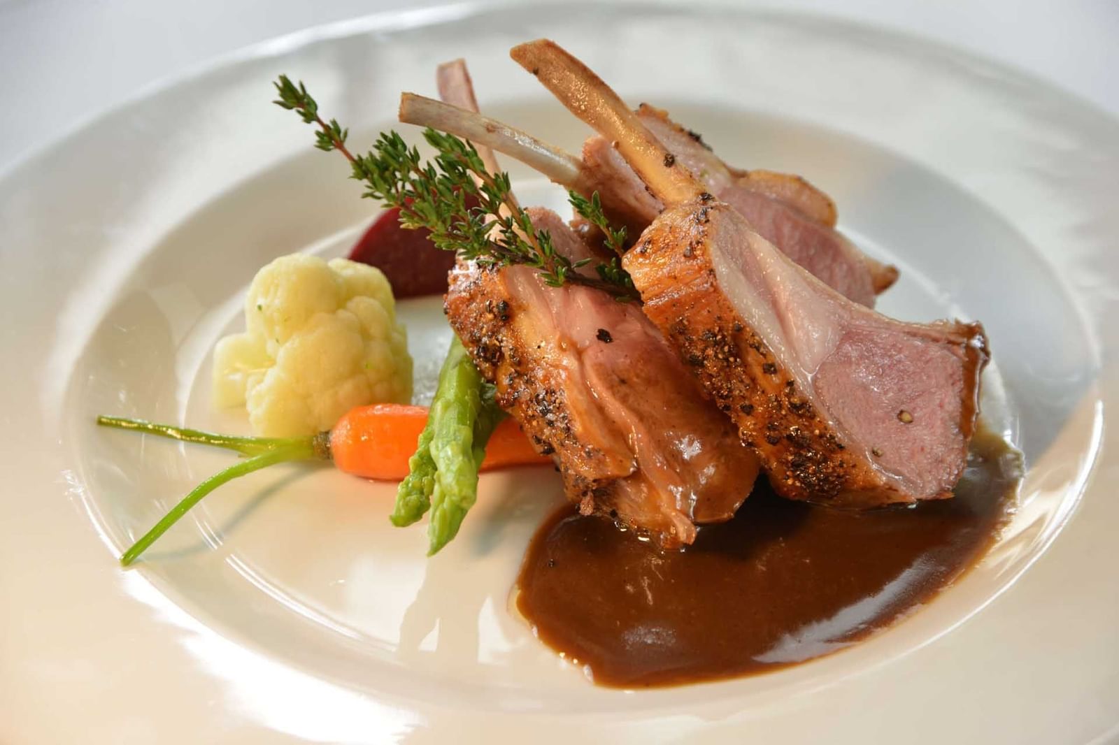 A lamb chop dish from Delagoa Restaurant at Polana Serena Hotel