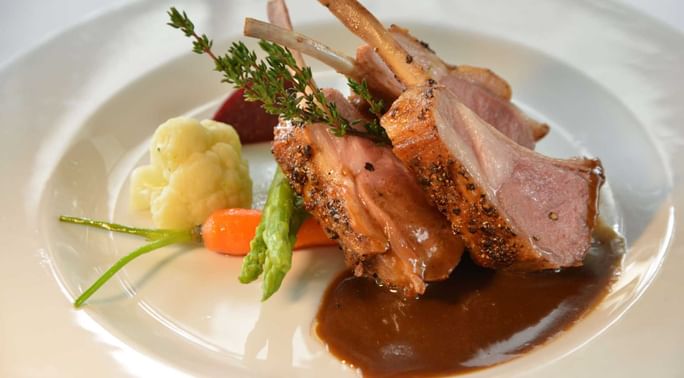 A lamb chop dish from Delagoa Restaurant at Polana Serena Hotel