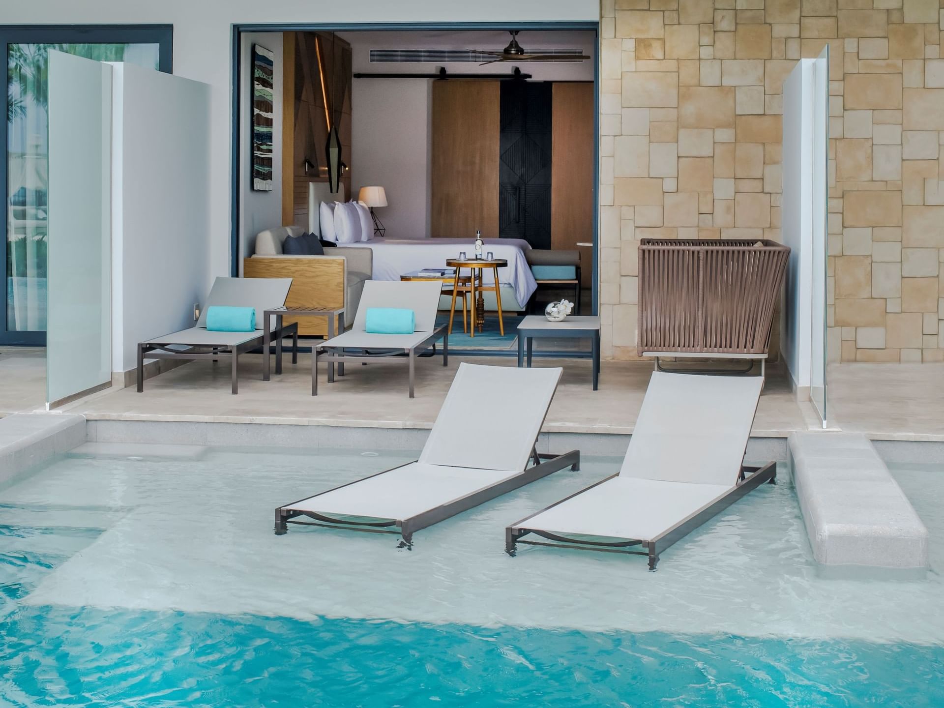 Sunloungers by the pool in a Junior Suite at Haven Riviera Cancun