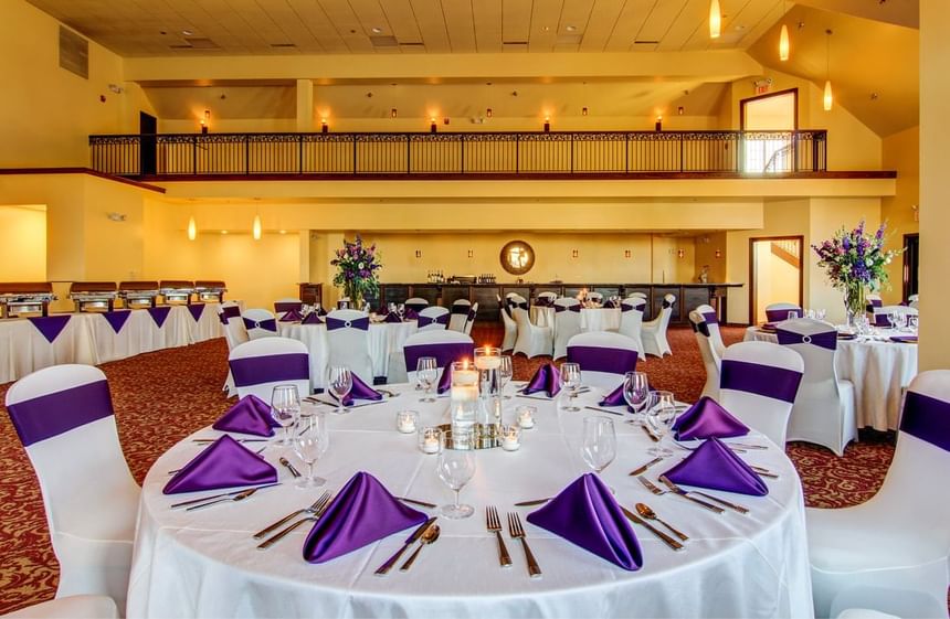 Banquet tables set-up in a wedding hall at The Wildwood Hotel