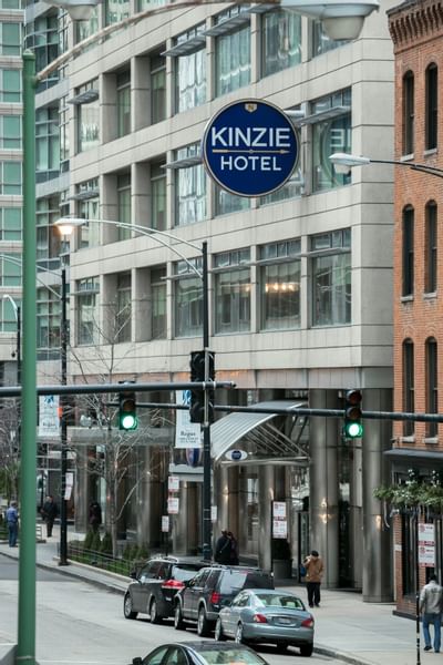 The exterior of the entrance of Kinzie Hotel with the name sign