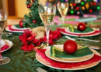 Elegant Christmas table decor with festive ornaments at Amora Hotel Jamison Sydney